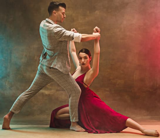 a girl and a boy dancing with each other