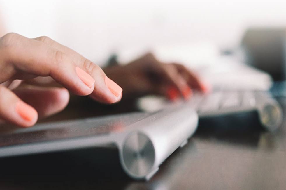 zoom of a keyboard with hand