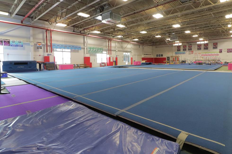 A blue mat in a gym